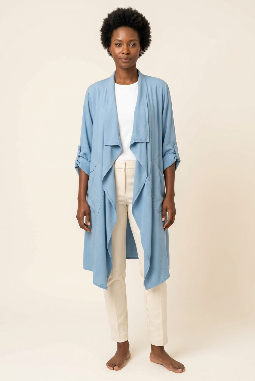Black woman wearing the blue cardigan