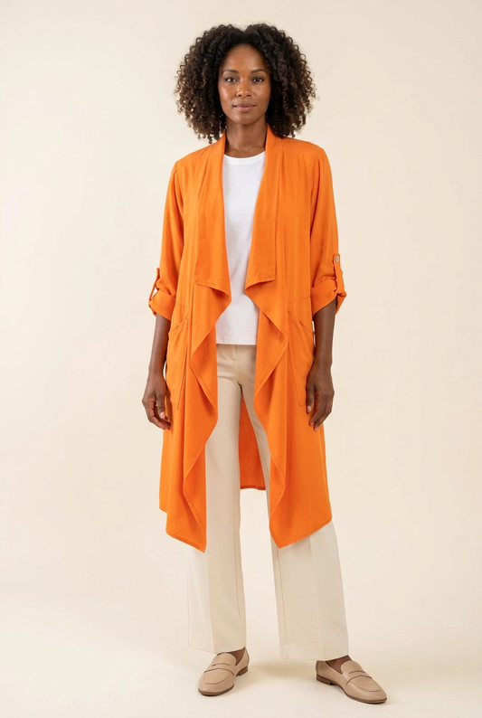 Black woman wearing the orange cardigan