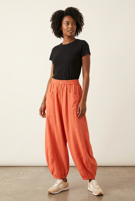 Woman wearing the coral pants